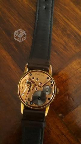 RELOJ OMEGA Tresor 1950 De ORO y rubies