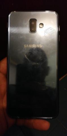 psp vita + un teléfono Samsung J6+