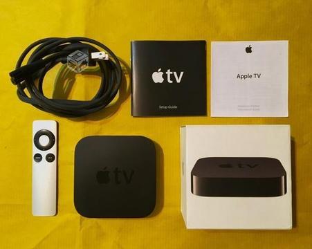 Apple TV con caja y accesorios