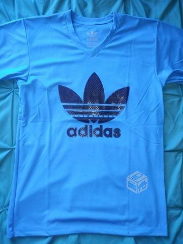 Polera adidas suprime azul con celeste