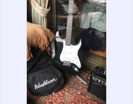 Guitarra Washburn Stratocaster con amplificador