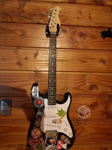 Guitarra stratocaster con pedales