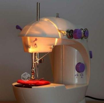 Mini maquina de coser con pedestal y luz