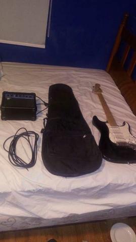 Guitarra electrica, con amplificador y funda
