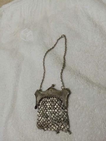 Antigua cartera de plata