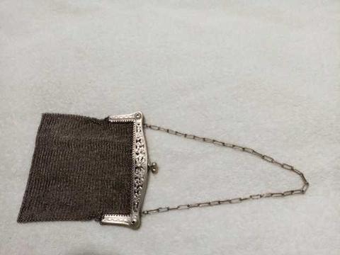 Cartera antigua de plata